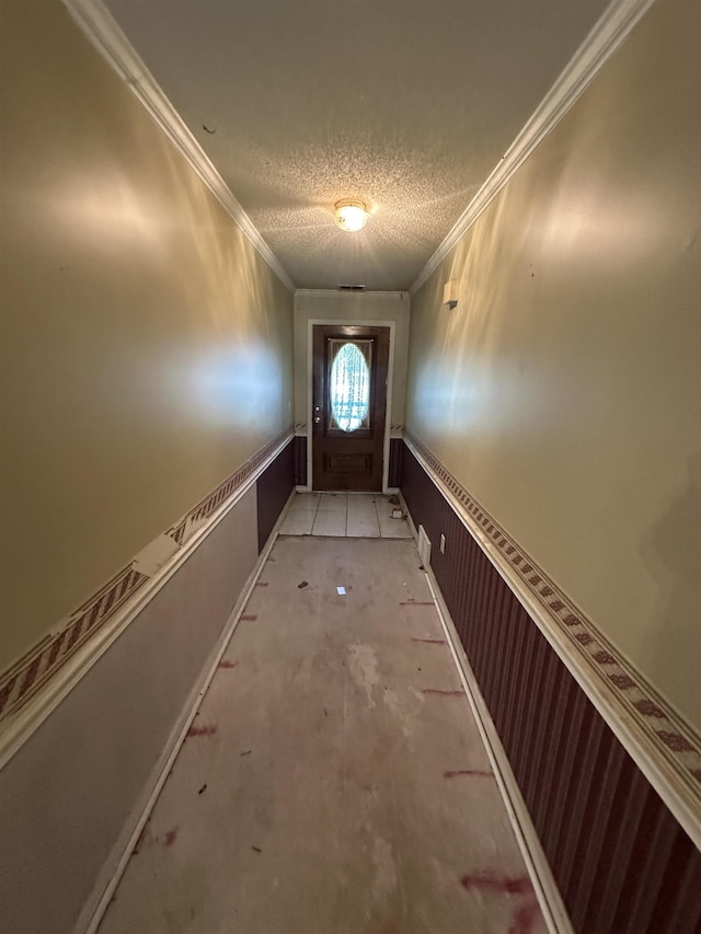 4378 Donnegan Cv, Memphis, TN 38125 - doorway with a textured ceiling and ornamental molding