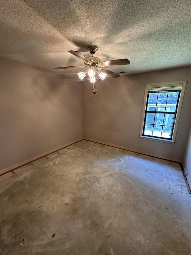 4378 Donnegan Cv, Memphis, TN 38125 - empty room featuring baseboards, a ceiling fan, and a textured ceiling