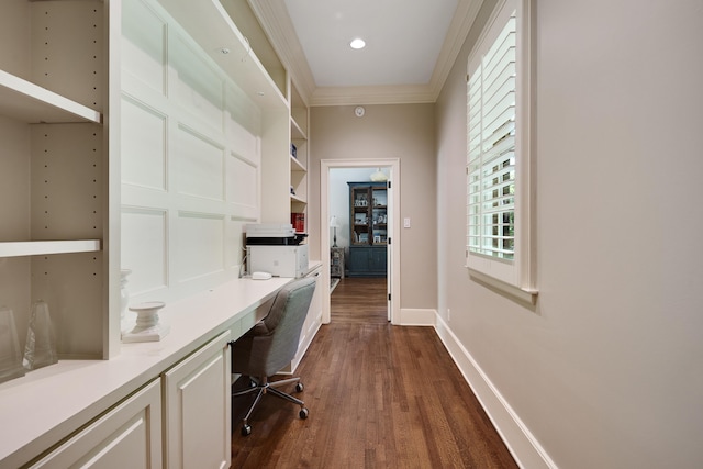 7726 Chapel Creek Pkwy N, Memphis, TN 38016 - office area featuring built in desk, ornamental molding, dark wood-style floors, and baseboards