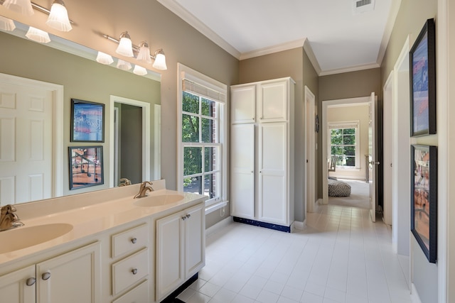 7726 Chapel Creek Pkwy N, Memphis, TN 38016 - full bathroom with double vanity, tile patterned flooring, baseboards, healthy amount of natural light, and crown molding