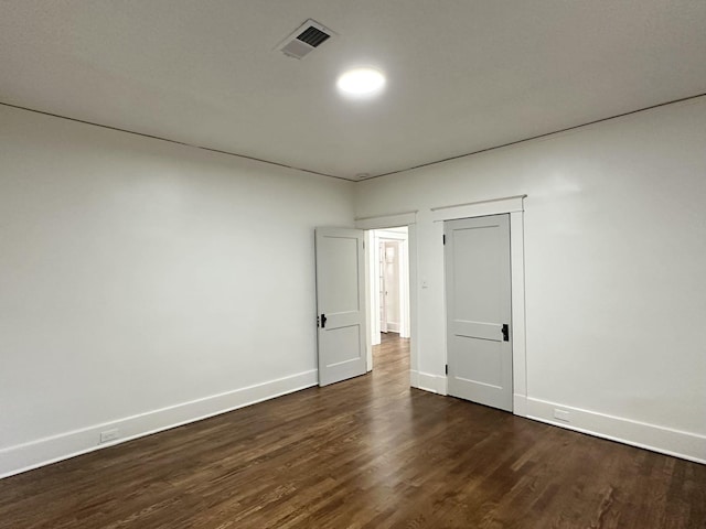 1151 Tanglewood St, Memphis, TN 38114 - spare room with dark wood finished floors and baseboards