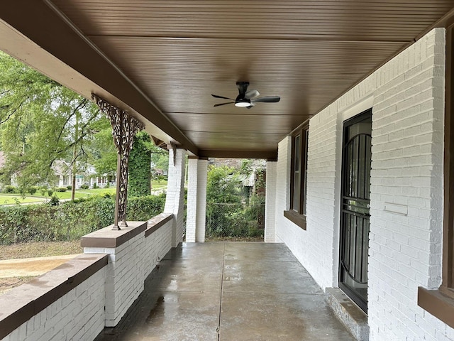 1151 Tanglewood St, Memphis, TN 38114 - covered porch with a ceiling fan