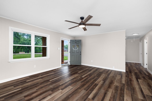 1512 Tipton Rd, Munford, TN 38058 - unfurnished living room featuring attic access, dark wood-style flooring, a ceiling fan, baseboards, and ornamental molding