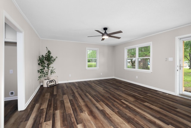 1512 Tipton Rd, Munford, TN 38058 - spare room featuring dark wood finished floors, ornamental molding, baseboards, and a ceiling fan