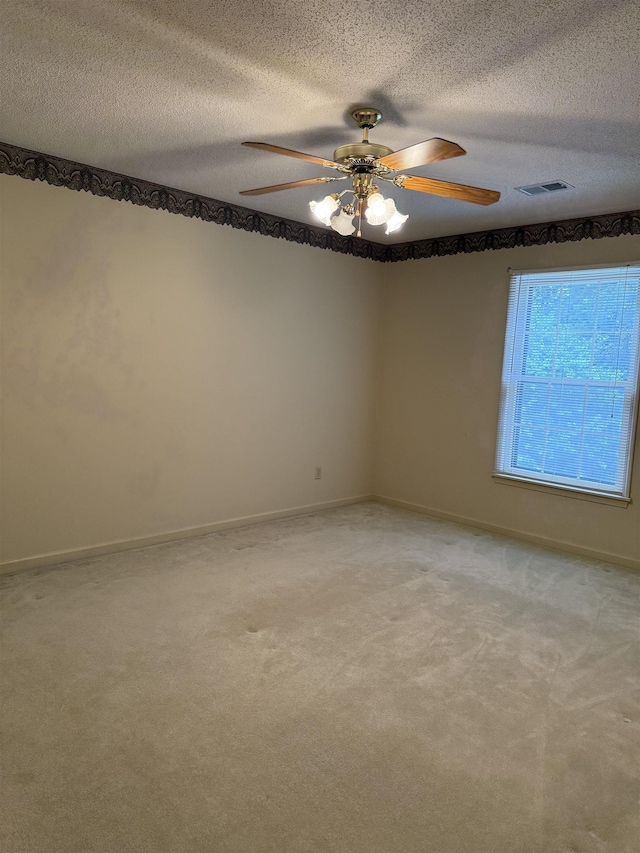 917 Valleyview Ln, Collierville, TN 38017 - unfurnished room featuring a ceiling fan, light colored carpet, a textured ceiling, and baseboards