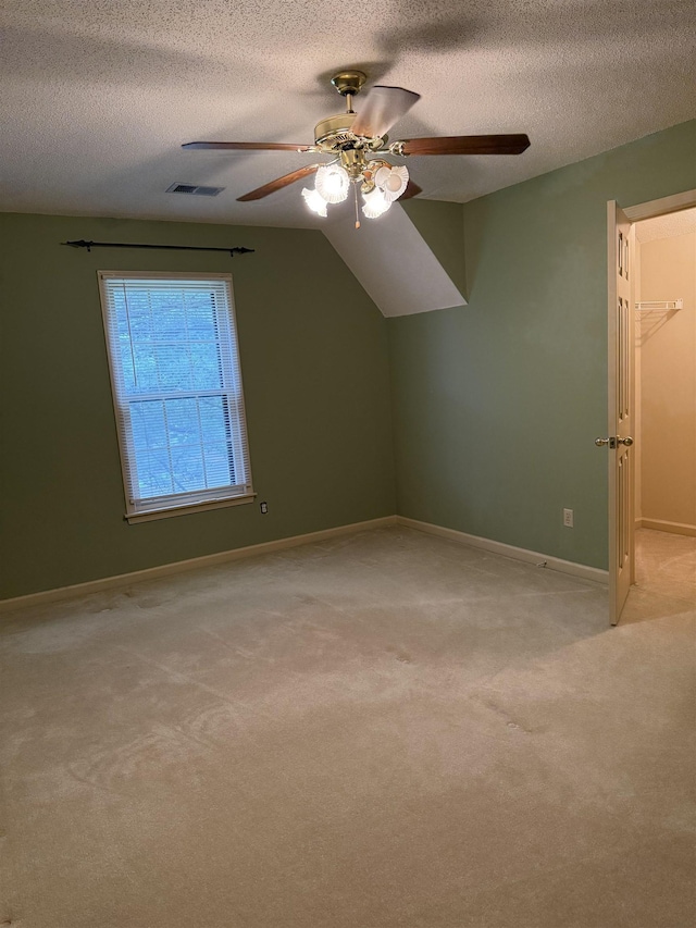 917 Valleyview Ln, Collierville, TN 38017 - additional living space with a ceiling fan, light colored carpet, a textured ceiling, and baseboards