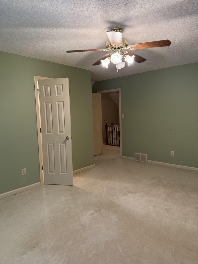 917 Valleyview Ln, Collierville, TN 38017 - empty room featuring a ceiling fan, baseboards, and a textured ceiling