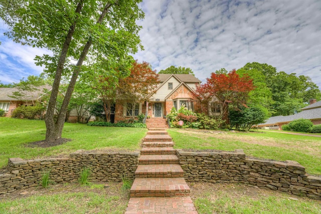 7352 Magnolia Ridge Dr, Germantown, TN 38138 - view of front of property featuring brick siding and a front lawn