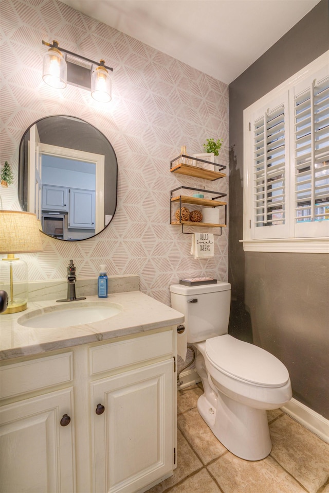 7352 Magnolia Ridge Dr, Germantown, TN 38138 - half bath with toilet, vanity, and tile patterned flooring