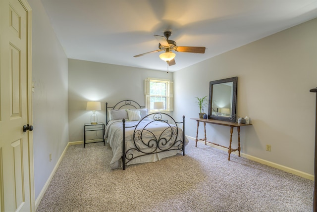 7352 Magnolia Ridge Dr, Germantown, TN 38138 - carpeted bedroom with baseboards and a ceiling fan