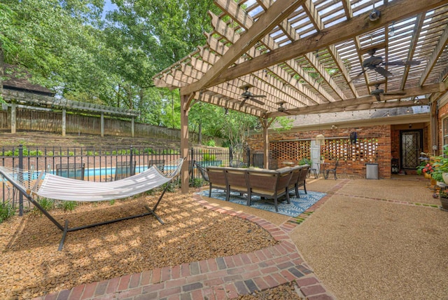 7352 Magnolia Ridge Dr, Germantown, TN 38138 - fenced backyard featuring a ceiling fan, a pergola, outdoor lounge area, and a patio area