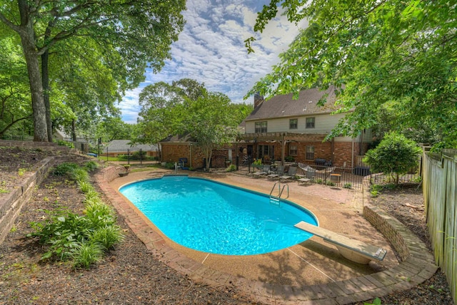 7352 Magnolia Ridge Dr, Germantown, TN 38138 - view of swimming pool with a patio area, a diving board, and a pergola
