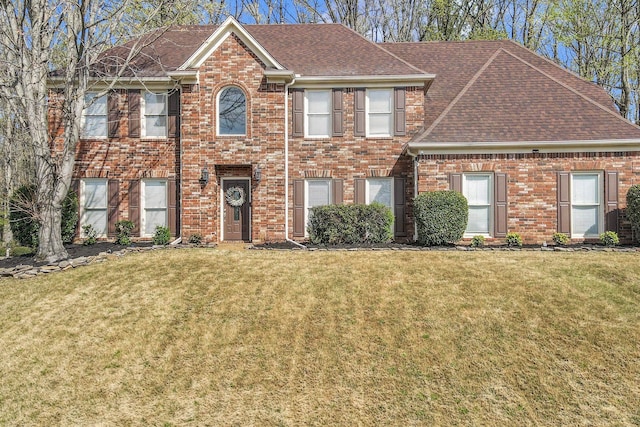 5578 Southern Winds Dr, Arlington, TN 38002 - view of front facade featuring brick siding, roof with shingles, and a front yard