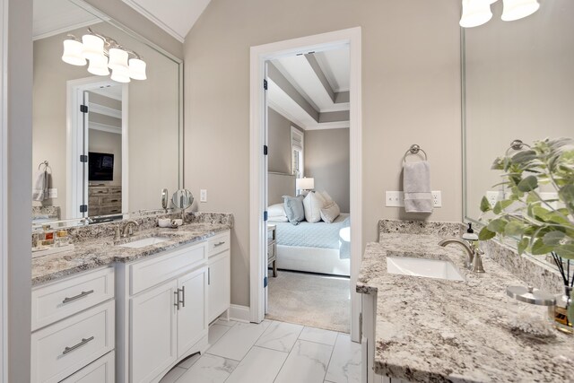 125 Magnolia Park Dr, Rossville, TN 38066 - ensuite bathroom featuring two vanities, crown molding, marble finish floors, a chandelier, and baseboards