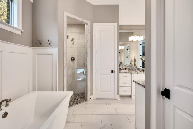 125 Magnolia Park Dr, Rossville, TN 38066 - full bath featuring marble finish floors, a freestanding tub, a shower stall, vanity, and ornamental molding