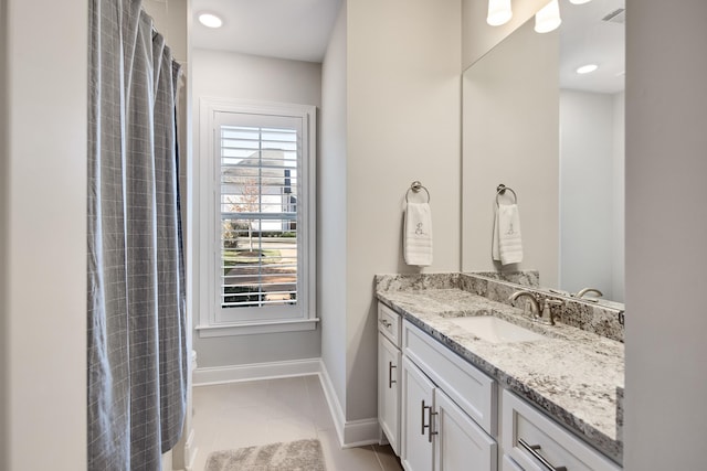 125 Magnolia Park Dr, Rossville, TN 38066 - full bath with vanity, tile patterned floors, toilet, and baseboards