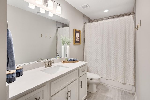 125 Magnolia Park Dr, Rossville, TN 38066 - bathroom with vanity, toilet, and shower / bath combo with shower curtain