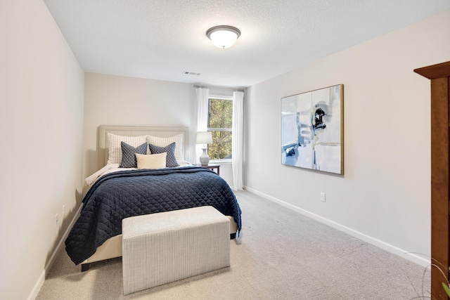 125 Magnolia Park Dr, Rossville, TN 38066 - carpeted bedroom featuring a textured ceiling and baseboards
