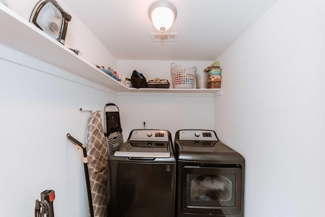 470 N Highland St, Memphis, TN 38122 - laundry area with washing machine and clothes dryer