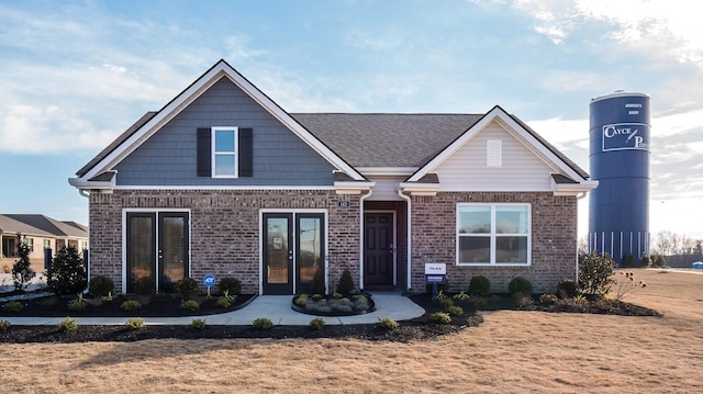 4494 Royster Creek Dr, Millington, TN 38053 - view of front of property featuring brick siding and french doors
