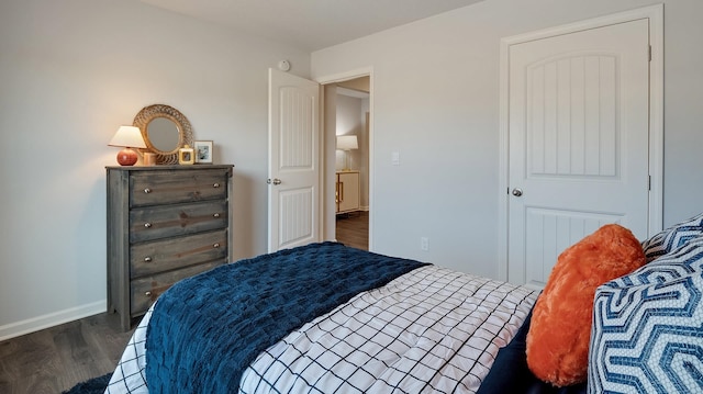 4494 Royster Creek Dr, Millington, TN 38053 - bedroom with dark wood-style flooring and baseboards