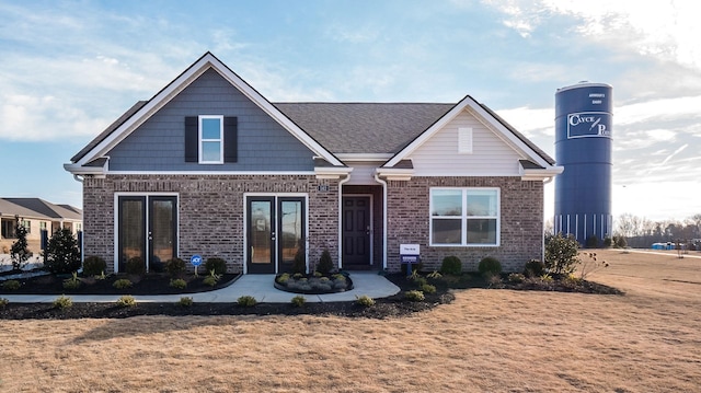 4494 Royster Creek Dr, Millington, TN 38053 - view of front facade with brick siding and french doors
