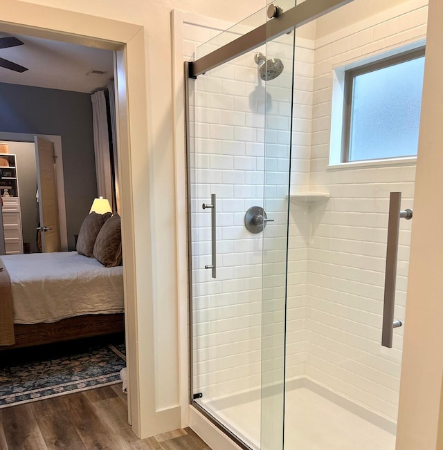 5510 Rams Horn Dr, Millington, TN 38053 - ensuite bathroom featuring a stall shower and wood finished floors