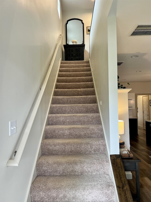5510 Rams Horn Dr, Millington, TN 38053 - stairs with baseboards and wood finished floors