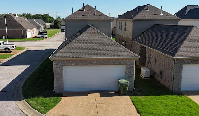 5510 Rams Horn Dr, Millington, TN 38053 - view of front facade featuring a residential view, roof with shingles, and brick siding