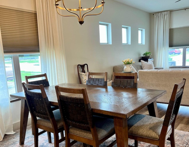5510 Rams Horn Dr, Millington, TN 38053 - dining space with wood finished floors and a chandelier