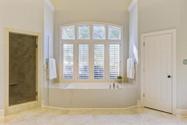 9200 Forest Hill Ln, Germantown, TN 38139 - full bathroom with a garden tub, a shower stall, and tile patterned floors
