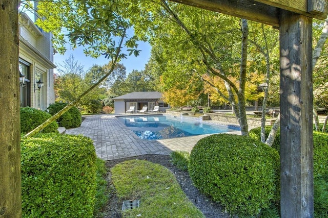 9200 Forest Hill Ln, Germantown, TN 38139 - outdoor pool with an exterior structure, an outdoor structure, and a patio area