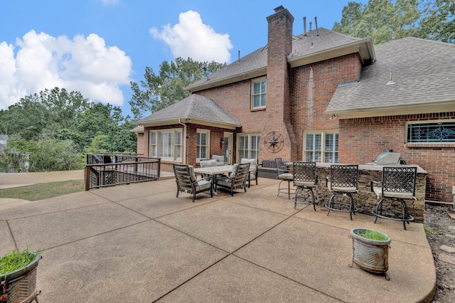 8955 Clair Douwie Cv, Bartlett, TN 38133 - view of patio featuring an outdoor living space