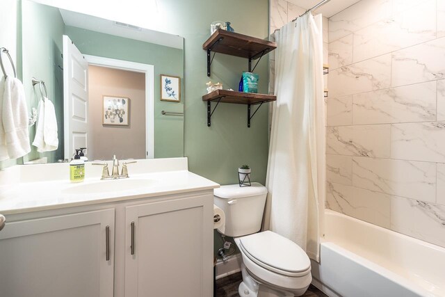 128 Loch Haven Cv S, Atoka, TN 38004 - bathroom featuring toilet, vanity, and shower / bath combo