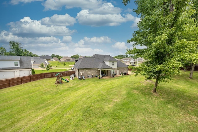 128 Loch Haven Cv S, Atoka, TN 38004 - view of yard featuring a playground and a residential view