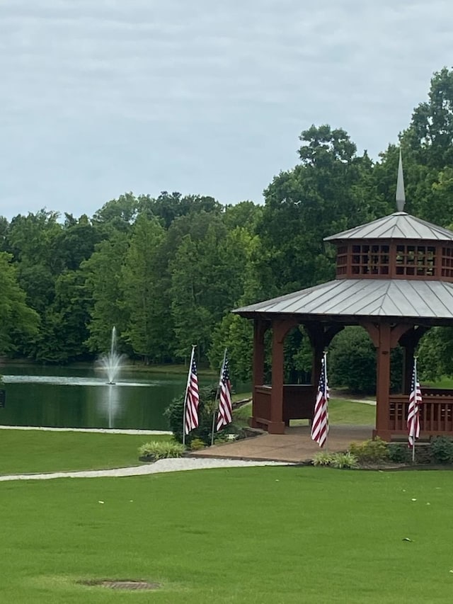 128 Loch Haven Cv S, Atoka, TN 38004 - view of community with a gazebo, a water view, a yard, and a view of trees