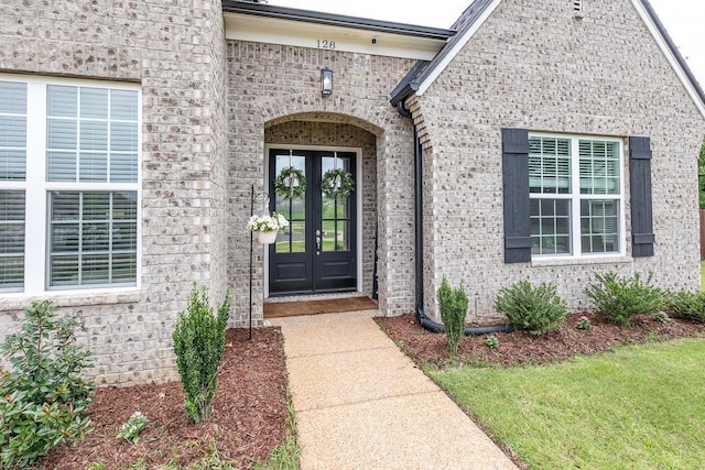 128 Loch Haven Cv S, Atoka, TN 38004 - doorway to property featuring french doors and brick siding
