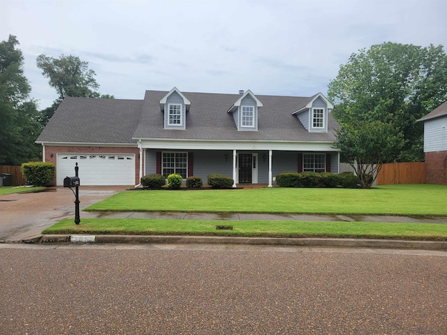 3659 Stonetrace Cir, Bartlett, TN 38135 - cape cod home featuring driveway, a garage, covered porch, and roof with shingles