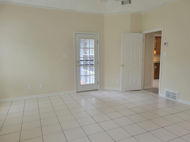 3659 Stonetrace Cir, Bartlett, TN 38135 - empty room featuring crown molding, light tile patterned flooring, and baseboards