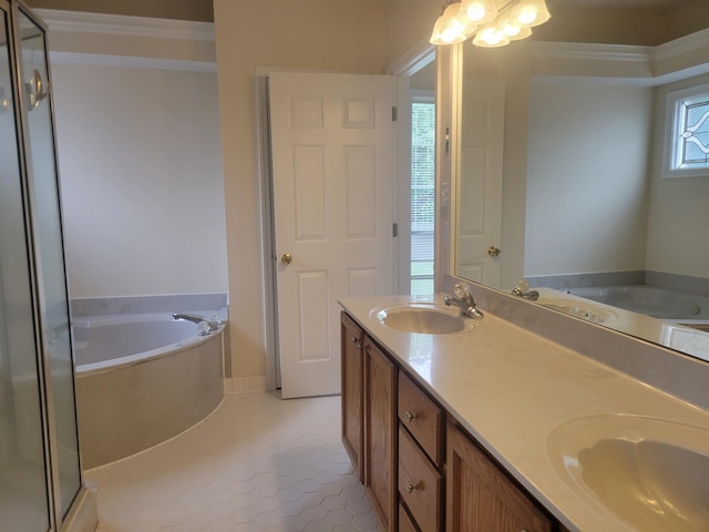 3659 Stonetrace Cir, Bartlett, TN 38135 - bathroom featuring a bath, double vanity, ornamental molding, tile patterned flooring, and a shower stall