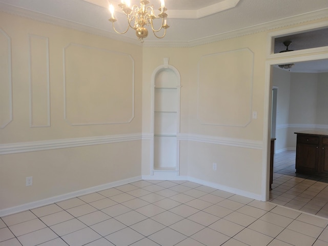 3659 Stonetrace Cir, Bartlett, TN 38135 - unfurnished room with a chandelier, light tile patterned flooring, crown molding, and built in shelves