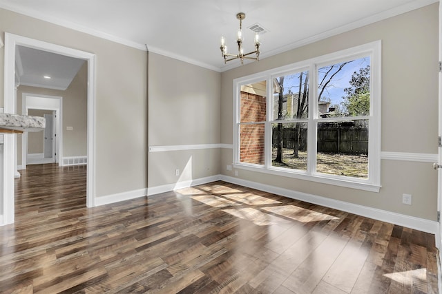 8917 River Sound Dr, Cordova, TN 38016 - unfurnished dining area featuring a chandelier, wood finished floors, baseboards, and crown molding