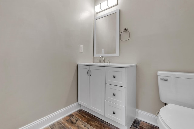 8917 River Sound Dr, Cordova, TN 38016 - bathroom with toilet, baseboards, vanity, and wood finished floors