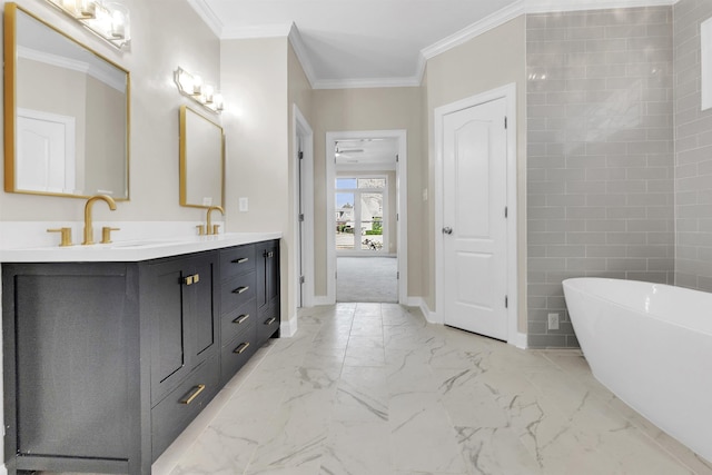 8917 River Sound Dr, Cordova, TN 38016 - bathroom featuring double vanity, a soaking tub, marble finish floors, baseboards, and ornamental molding