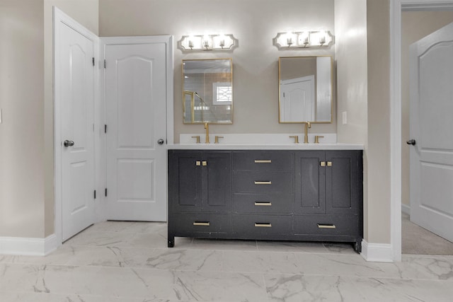 8917 River Sound Dr, Cordova, TN 38016 - full bathroom with marble look tile flooring, baseboards, and double vanity