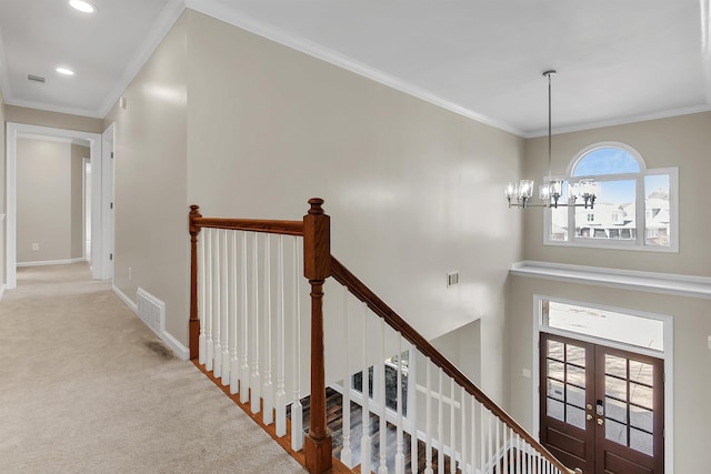 8917 River Sound Dr, Cordova, TN 38016 - hall with an upstairs landing, a chandelier, carpet floors, french doors, and crown molding