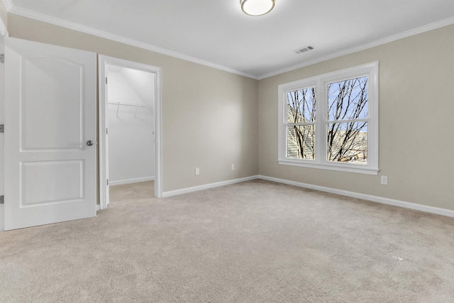8917 River Sound Dr, Cordova, TN 38016 - unfurnished bedroom with carpet floors, crown molding, a spacious closet, baseboards, and a closet