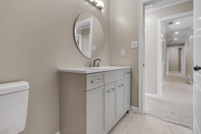 8917 River Sound Dr, Cordova, TN 38016 - bathroom with vanity, toilet, ornamental molding, marble look tile flooring, and baseboards