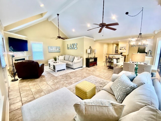 29 Frank Fwy, Iuka, MS 38852 - living area featuring a ceiling fan, beamed ceiling, a fireplace, high vaulted ceiling, and baseboards