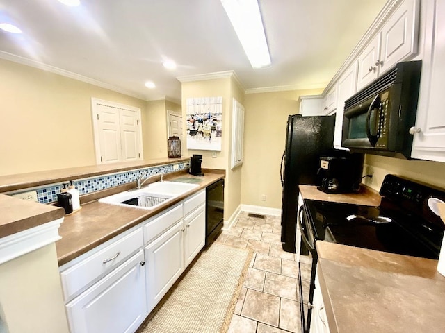 29 Frank Fwy, Iuka, MS 38852 - kitchen featuring black appliances, a sink, white cabinets, ornamental molding, and recessed lighting